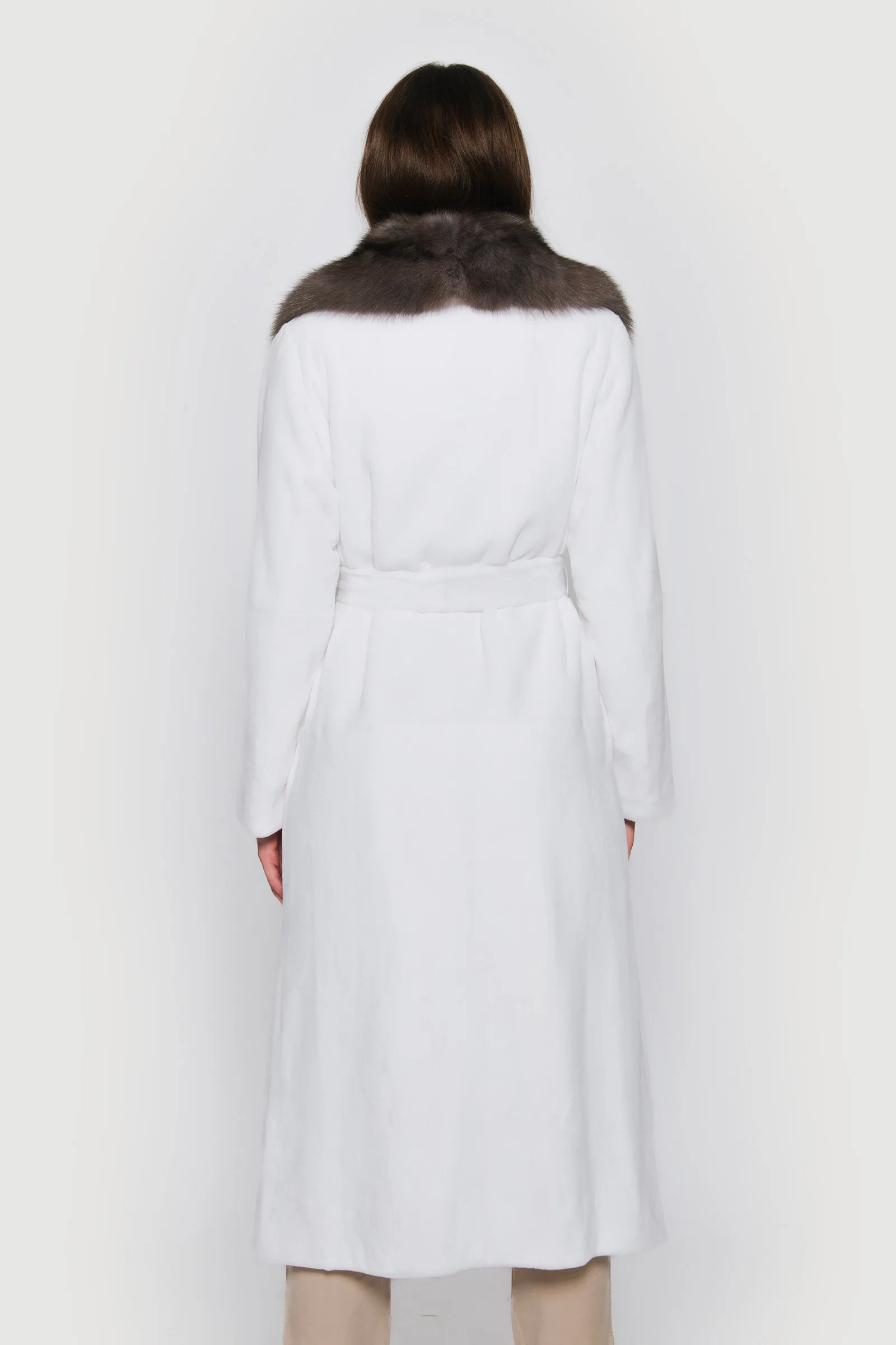--Coat in white mink and sable smoke-